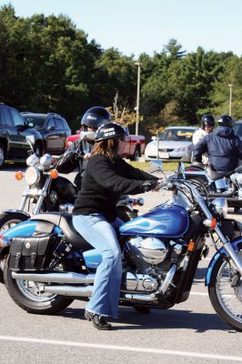 Poker Run
Motorcyclists gathered Sunday morning, September 20, in the parking lot of ORR to ride in the third annual Poker Run for Alex Pateakos. Alex is a five-year-old Marion boy who suffers from Spinal Muscular Atrophy. Money raised by the poker run will benefit Alex, and Families of SMA, a group that helps families like the Pateakos live their lives as close to normal as possible. The Poker Run covered 65 miles and ran through Lakeville, Carver, East Wareham, and back to ORR. Photo by Anne O'Brien-Kakley
