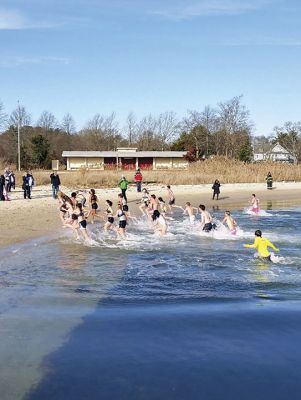 Tabor takes the Plunge!
Tabor takes the Plunge! Tabor Academy students and faculty raced towards the icy waters off Silvershell beach on December 9 for a Polar Plunge, raising funds for the Special Olympics. Photos by Wayne 
