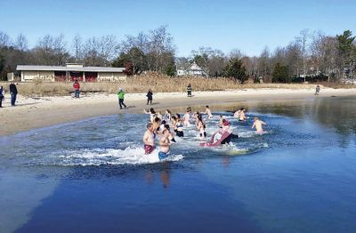 Tabor takes the Plunge!
Tabor takes the Plunge! Tabor Academy students and faculty raced towards the icy waters off Silvershell beach on December 9 for a Polar Plunge, raising funds for the Special Olympics. Photos by Wayne 
