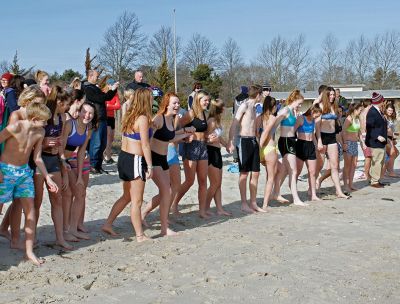 Tabor Academy Polar Plunge
Tabor Academy hosted its second annual Polar Plunge on Sunday, January 21 at Silvershell Beach to raise money for the school’s Special Olympics Young Athletes Program. Students from ‘fundraising rival’ Sandwich High also showed up, with scores of students and staff making a dash in and quickly out of the chilly waters. The plunge raised about $8,000. Photos by Deina Zartman
