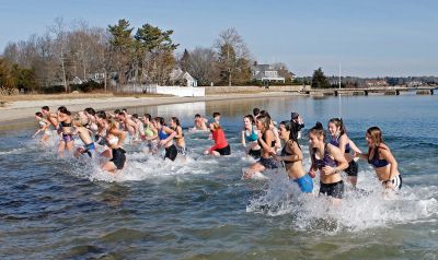 Tabor Academy Polar Plunge
Tabor Academy hosted its second annual Polar Plunge on Sunday, January 21 at Silvershell Beach to raise money for the school’s Special Olympics Young Athletes Program. Students from ‘fundraising rival’ Sandwich High also showed up, with scores of students and staff making a dash in and quickly out of the chilly waters. The plunge raised about $8,000. Photos by Deina Zartman
