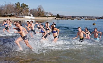 Tabor Academy Polar Plunge
Tabor Academy hosted its second annual Polar Plunge on Sunday, January 21 at Silvershell Beach to raise money for the school’s Special Olympics Young Athletes Program. Students from ‘fundraising rival’ Sandwich High also showed up, with scores of students and staff making a dash in and quickly out of the chilly waters. The plunge raised about $8,000. Photos by Deina Zartman
