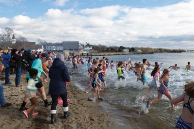 Making a Splash!
Making a Splash! Over 100 participants took the icy plunge into the frigid waters at Mattapoisett Town Beach on January 1 during the annual Freezin’ for a Reason Polar Plunge on New Year’s Day. Proceeds go to benefit the BAM Foundation, a local charity that fundraises to provide financial assistance to people who are facing cancer treatment. Photos by Colin Veitch
