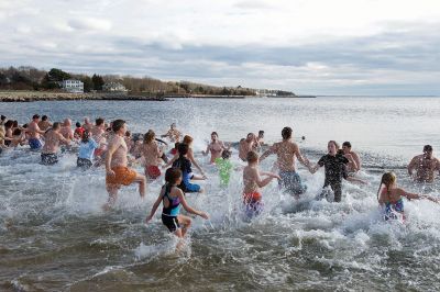 Making a Splash!
Making a Splash! Over 100 participants took the icy plunge into the frigid waters at Mattapoisett Town Beach on January 1 during the annual Freezin’ for a Reason Polar Plunge on New Year’s Day. Proceeds go to benefit the BAM Foundation, a local charity that fundraises to provide financial assistance to people who are facing cancer treatment. Photos by Colin Veitch
