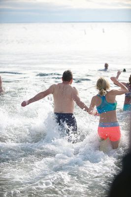 Making a Splash!
Making a Splash! Over 100 participants took the icy plunge into the frigid waters at Mattapoisett Town Beach on January 1 during the annual Freezin’ for a Reason Polar Plunge on New Year’s Day. Proceeds go to benefit the BAM Foundation, a local charity that fundraises to provide financial assistance to people who are facing cancer treatment. Photos by Colin Veitch
