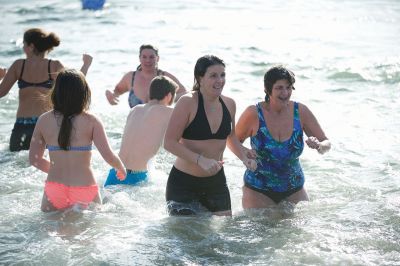 Making a Splash!
Making a Splash! Over 100 participants took the icy plunge into the frigid waters at Mattapoisett Town Beach on January 1 during the annual Freezin’ for a Reason Polar Plunge on New Year’s Day. Proceeds go to benefit the BAM Foundation, a local charity that fundraises to provide financial assistance to people who are facing cancer treatment. Photos by Colin Veitch
