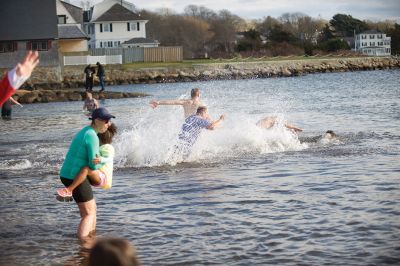 Making a Splash!
Making a Splash! Over 100 participants took the icy plunge into the frigid waters at Mattapoisett Town Beach on January 1 during the annual Freezin’ for a Reason Polar Plunge on New Year’s Day. Proceeds go to benefit the BAM Foundation, a local charity that fundraises to provide financial assistance to people who are facing cancer treatment. Photos by Colin Veitch
