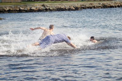 Making a Splash!
Making a Splash! Over 100 participants took the icy plunge into the frigid waters at Mattapoisett Town Beach on January 1 during the annual Freezin’ for a Reason Polar Plunge on New Year’s Day. Proceeds go to benefit the BAM Foundation, a local charity that fundraises to provide financial assistance to people who are facing cancer treatment. Photos by Colin Veitch
