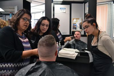 No Shave November
Time was up for five Rochester police officers participating in the department’s 2nd annual No Shave November who said farewell to their beards and goatees as cosmetology students at Old Colony treated the officers to a shave on December 1. Photos by Jean Perry
