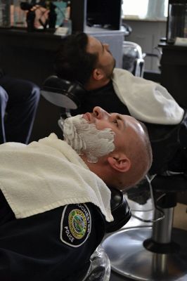 No Shave November
Time was up for five Rochester police officers participating in the department’s 2nd annual No Shave November who said farewell to their beards and goatees as cosmetology students at Old Colony treated the officers to a shave on December 1. Photos by Jean Perry
