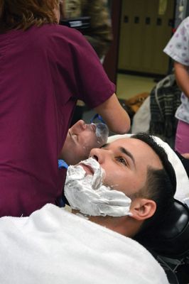 No Shave November
Time was up for five Rochester police officers participating in the department’s 2nd annual No Shave November who said farewell to their beards and goatees as cosmetology students at Old Colony treated the officers to a shave on December 1. Photos by Jean Perry
