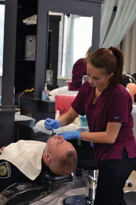 No Shave November
Time was up for five Rochester police officers participating in the department’s 2nd annual No Shave November who said farewell to their beards and goatees as cosmetology students at Old Colony treated the officers to a shave on December 1. Photos by Jean Perry
