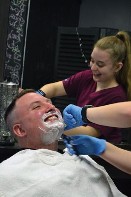 No Shave November
Time was up for five Rochester police officers participating in the department’s 2nd annual No Shave November who said farewell to their beards and goatees as cosmetology students at Old Colony treated the officers to a shave on December 1. Photos by Jean Perry
