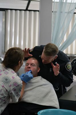 No Shave November
Time was up for five Rochester police officers participating in the department’s 2nd annual No Shave November who said farewell to their beards and goatees as cosmetology students at Old Colony treated the officers to a shave on December 1. Photos by Jean Perry
