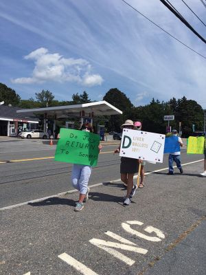 Save the Post Office
Members of the Mattapoisett Democratic committee were expressing their opinions at the corners of Route 6 and North Street on Saturday August 22nd. Photo by Marilou Newell
