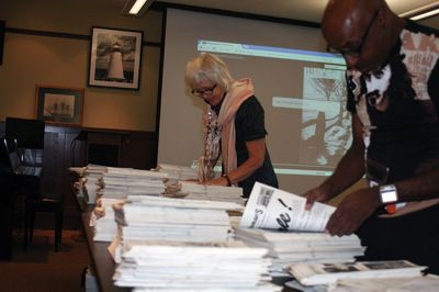 Presto Press
A partnership between the Mattapoisett Historical Society and the public library allowed the sale of duplicate issues of the Presto Press, which was printed from the 1950s until the early 1990s. People poured over the stacks seeking a specific issue or year to take home for their personal archives. The monies raised will be used to defray the cost of storing the publications in a climate-controlled space. Photos by Marilou Newell
