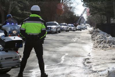 Service for Lt. Paul Silveira
Police officers from throughout the SouthCoast, including Mattapoisett, Marion, Rochester, Acushnet, New Bedford and Dartmouth, marched in procession to Cushing Cemetery for the funeral of Detective Lt. Paul Silveira on Thursday, January 20, 2011. Mr. Silveira, who had served on the Mattapoisett Police Department since 1984, died unexpectedly of a brain aneurysm on January 14, 2011. Photo by Laura.
