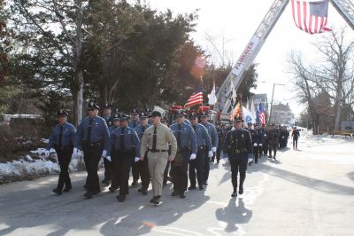 Service for Lt. Paul Silveira
Police officers from throughout the SouthCoast, including Mattapoisett, Marion, Rochester, Acushnet, New Bedford and Dartmouth, marched in procession to Cushing Cemetery for the funeral of Detective Lt. Paul Silveira on Thursday, January 20, 2011. Mr. Silveira, who had served on the Mattapoisett Police Department since 1984, died unexpectedly of a brain aneurysm on January 14, 2011. Photo by Laura.
