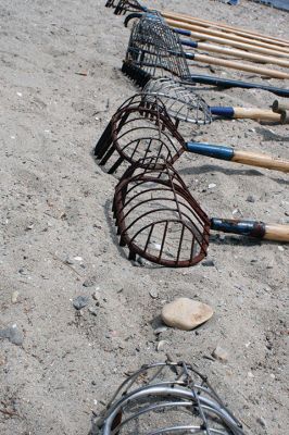 Buzzards Bay Coalition
Cassie Lawson of the Buzzards Bay Coalition led a group of 30 adults and children through the rigors of shellfishing on July 22 at the Mattapoisett town beach located adjacent to the YMCA camp. Lawson explained the physiology of the bivalves, how to use a shellfish rake, and the importance of obtaining a permit and being mindful of the difference between open and closed shellfish beds. Photo by Marilou Newel - July 27, 2017 edition
