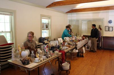 Friend's Yard Sale
Mary Roberts tends a table at the Friends Meeting House Yard Sale on October 13, 2007,
