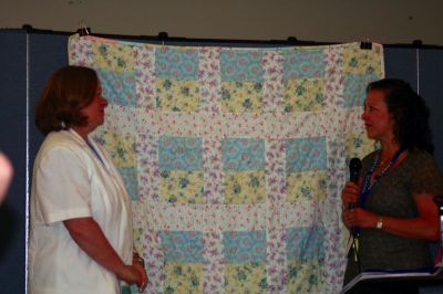Quilt Donation
Diane LeRoys second graders at the Center School made this flannel quilt from recycled scraps and donated it to the New Bedford Womens Shelter on June 3, 2010. Photo by Anne OBrien-Kakley.
