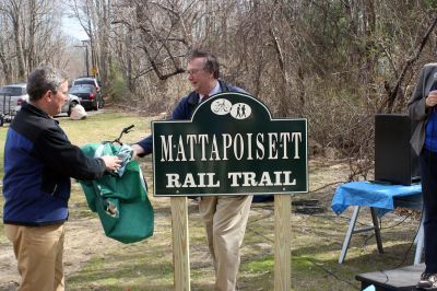 Rail Trail
Bill Straus, State Representative, Steve Kelleher, Chairman of Mattapoisett Rail Trail, and Jordan Collyer, Vice-Chairman of the Mattapoisett Board of Selectman (left to right) cut the ribbon to open the Inauguration of the Mattapoisett Rail Trails Old Colony Mile. Photo by Sarah K. Taylor. 
