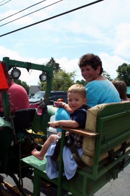 Rochester Country Fair
It was fun in the August sun at the 2009 Rochester Country Fair. Plumb Corner was transformed into the ultimate fairground, with lots of craft and food vendors, and fun activities. Fair-goers enjoyed a scarecrow contest, a tractor-pull, a frog jumping contest, a children's parade, and so much more. Photo by Robert Chiarito
