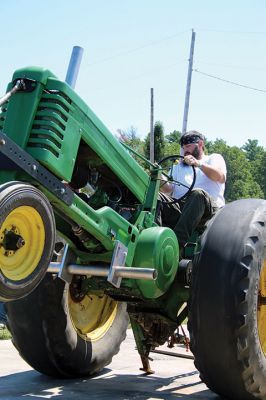 Rochester Country Fair
The Rochester Country Fair pressed on in the face of a “critical” EEE threat in Rochester over the weekend, August 10-11. Festivities were canceled for Thursday and Friday, but there was plenty of tractors, music, vendors, and fried fair food to keep the spirit of the Rochester Country Fair alive. Photos by Jean Perry
