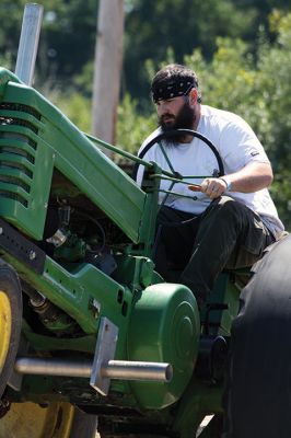 Rochester Country Fair
The Rochester Country Fair pressed on in the face of a “critical” EEE threat in Rochester over the weekend, August 10-11. Festivities were canceled for Thursday and Friday, but there was plenty of tractors, music, vendors, and fried fair food to keep the spirit of the Rochester Country Fair alive. Photos by Jean Perry
