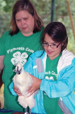 The Sun Will Come Out … Tomorrow 
Friday was a washout at the Rochester Country Fair, but the rain didn’t dampen the fun for those who braved the elements. Photos by Jean Perry
