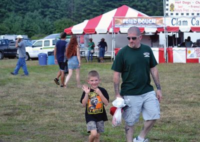 Farmers, Families, Fiddles 
Along with the sun on Saturday came the crowds to the Rochester Country Fair. Kid’s activities that were canceled on Friday resumed on Saturday under a blue sky. Photos by Jonathan Comey
