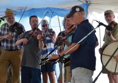 Farmers, Families, Fiddles 
Along with the sun on Saturday came the crowds to the Rochester Country Fair. Kid’s activities that were canceled on Friday resumed on Saturday under a blue sky. Photos by Jonathan Comey
