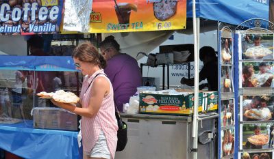 Farmers, Families, Fiddles 
Along with the sun on Saturday came the crowds to the Rochester Country Fair. Kid’s activities that were canceled on Friday resumed on Saturday under a blue sky. Photos by Jonathan Comey
