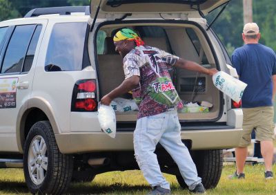 Farmers, Families, Fiddles 
Along with the sun on Saturday came the crowds to the Rochester Country Fair. Kid’s activities that were canceled on Friday resumed on Saturday under a blue sky. Photos by Jonathan Comey
