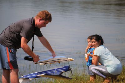 The Buzz Above Rochester 
Remote control airplane enthusiasts lined the shores of Mary’s Pond for the annual John Nicolaci Memorial Float Fly. Photos by Jonathan Comey
