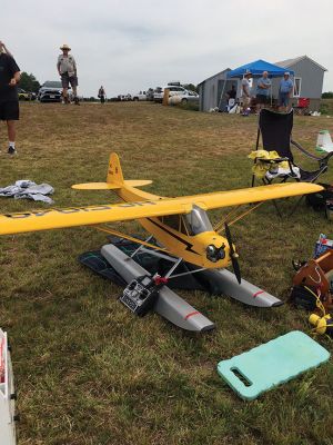 Bristol County Radio Control Club 
Members of the Bristol County Radio Control Club gathered on August 20 at Mary's Pond in Rochester for the annual fun fly of radio-controlled pontoon airplanes. Nationally, there are several thousand recognized clubs engaged in the activity, said Ned Watts, an avid pilot of the Styrofoam craft. Ruth Nicolaci of Marion, whose husband John helped found the club, was on hand to enjoy the event. Photos by Marilou Newell
