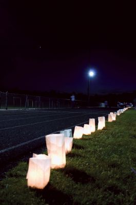 Relay for Life
Over 200 Tri-Town residents gathered to help raise money for the American Cancer Society by participating in the fifth annual Relay for Life. The Relay started at 5:00 pm on Friday June 11 and continued until 12:00 pm on Saturday. Participants walked the track at ORR throughout the night and into the next afternoon as a way to honor cancer survivors and those who lost their battle to cancer. Personalized luminaria bags lined the track, lighting the way for the participants throughout the night. 
