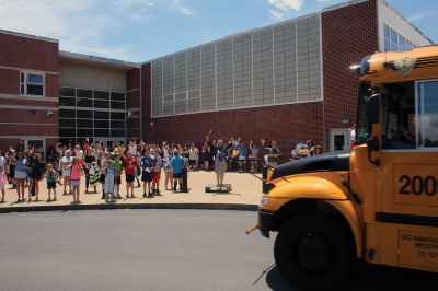 Rochester Memorial School
Rochester Memorial School students enjoyed their farewell to the 2022-23 school year on June 24, as RMS held its rowdy tradition featuring a faculty and staff orchestra serenading in song. Bus drivers took extra laps around the loop to the cheers of their families, as the children waved. Photos by Mick Colageo
