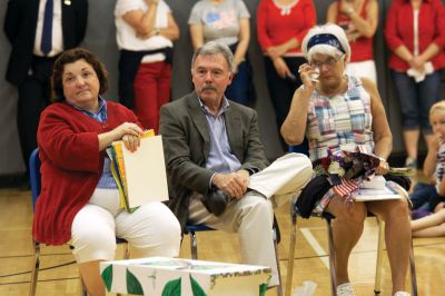 RMS Retirement
The Rochester Memorial School community celebrated the up-coming retirement of three beloved faculty members, (from left) reading specialist Candy Miller-Mitchell, principal Jay Ryan, and second grade teacher Joyce Bourdon.  Members of the student body, PTO, and RMS Student Council offered speeches of praise and thank-you gifts to the out-going faculty members in a ceremony in the RMS gym on Thursday, June 14, 2012.  Photo by Eric Tripoli.  
