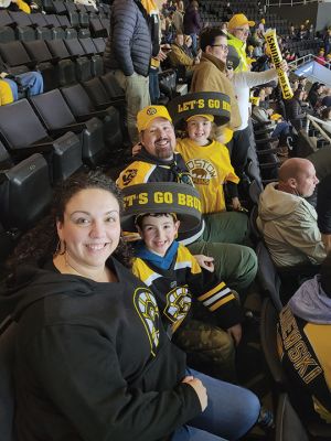 Rochester Memorial School
Over 40 Rochester Memorial School fifth- and sixth-grade chorus students sang the national anthem before the January 14 Providence Bruins game. Among those having a good time at the good ol’ hockey game are sixth-grader Hayden Silva, the Realini family, Grade 5 teacher Mike Forns and Music and Chorus teacher Susan Audette. Photos courtesy ORR District
