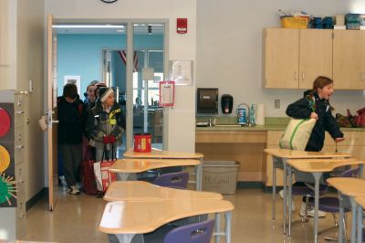 RMS Expansion
Rochester Memorial School students received their biggest present after the holidays. On January 4, 2011, students took their seats in the schools new 11,000 square foot addition and school wing for the first time. The $26.5 million construction and renovation project will be completed by the fall. Photos by Laura Pedulli.
