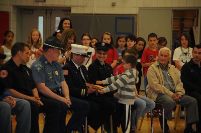 Flag Day Ceremony 
Rochester Memorial School 4th Grade held an all school Flag Day ceremony on June 14th honoring and thanking community first responders.  Commencing this energy filled event was the raising of the flag to the National Anthem followed by the Pledge of Allegiance.  Acknowledgements to a fantastic show of local and state police, fire fighters, EMT’s, veterans and serving military heroes was presented through 4th grade students and famous poems, songs and personal thank yous. Photos courtesy of Ilana Mackin
