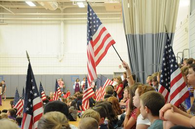 Flag Day Ceremony 
Rochester Memorial School 4th Grade held an all school Flag Day ceremony on June 14th honoring and thanking community first responders.  Commencing this energy filled event was the raising of the flag to the National Anthem followed by the Pledge of Allegiance.  Acknowledgements to a fantastic show of local and state police, fire fighters, EMT’s, veterans and serving military heroes was presented through 4th grade students and famous poems, songs and personal thank yous. Photos courtesy of Ilana Mackin
