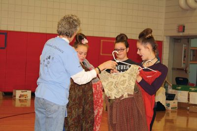 Asian Market
RMS sixth-grade students of Danni Kleiman and James Sullivan participated in the school’s very first “Asian Market” on Friday, December 9, as a way to learn about bartering and commerce. Students representing a host of different countries set up their stands to sell goods such as oil, cotton, sugar, produce, and livestock. Photos by Jean Perry
