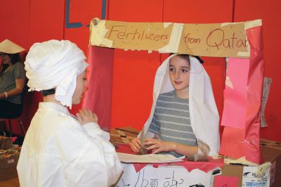 Asian Market
RMS sixth-grade students of Danni Kleiman and James Sullivan participated in the school’s very first “Asian Market” on Friday, December 9, as a way to learn about bartering and commerce. Students representing a host of different countries set up their stands to sell goods such as oil, cotton, sugar, produce, and livestock. Photos by Jean Perry
