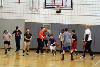 RMS Basketball
It was a pretty close game, 67-59, at Rochester Memorial School on January 23. It was the annual sixth grade vs. staff basketball game, and this year it was attended by a record crowd. $370 was raised for the Nurse Thayer Scholarship Fund. “It was a great event,” said RMS Principal Derek Medeiros. “It’s all about the engagement, and seeing all those people there was great.” Photos by Jean Perry
