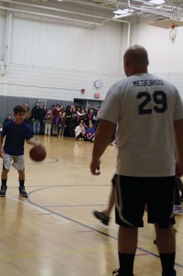 RMS Basketball
It was a pretty close game, 67-59, at Rochester Memorial School on January 23. It was the annual sixth grade vs. staff basketball game, and this year it was attended by a record crowd. $370 was raised for the Nurse Thayer Scholarship Fund. “It was a great event,” said RMS Principal Derek Medeiros. “It’s all about the engagement, and seeing all those people there was great.” Photos by Jean Perry
