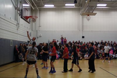 RMS Basketball
It was a pretty close game, 67-59, at Rochester Memorial School on January 23. It was the annual sixth grade vs. staff basketball game, and this year it was attended by a record crowd. $370 was raised for the Nurse Thayer Scholarship Fund. “It was a great event,” said RMS Principal Derek Medeiros. “It’s all about the engagement, and seeing all those people there was great.” Photos by Jean Perry
