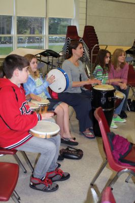 RMS Drum Circle
Otha Day led about 50 people in a drum circle on Monday, April 30 in Rochester Memorial School cafeteria. The event was sponsored by the RMS PTO. Photos by Laura Fedak Pedulli. 
