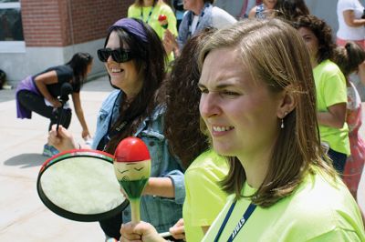 Last Day of School
June 19 was the last day of school at RMS, and the teachers and staff celebrated with their traditional student sendoff. Conductor Danni Kleiman led the teachers in song as the busses full of waving students looped around the parking lot before heading off toward summer break. Photos by Jean Perry
